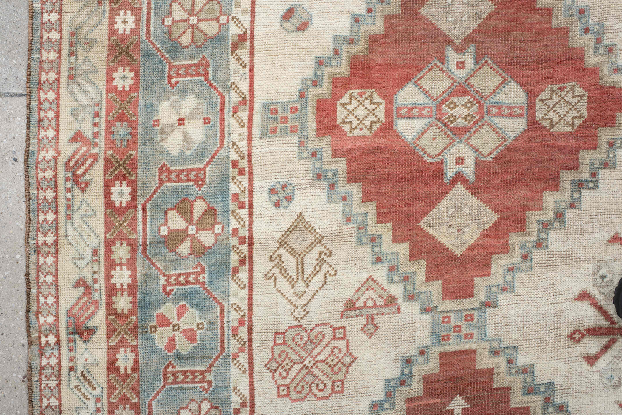 5' x 10' one-of-a-kind handmade vintage Shiraz medium size rug. Color palette: ivory, terra cotta, sky blue, rust, beige
