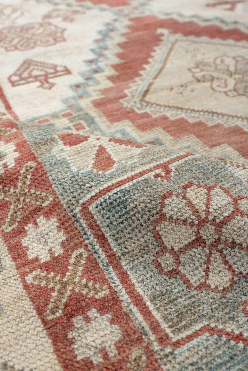5' x 10' one-of-a-kind handmade vintage Shiraz medium size rug. Color palette: ivory, terra cotta, sky blue, rust, beige