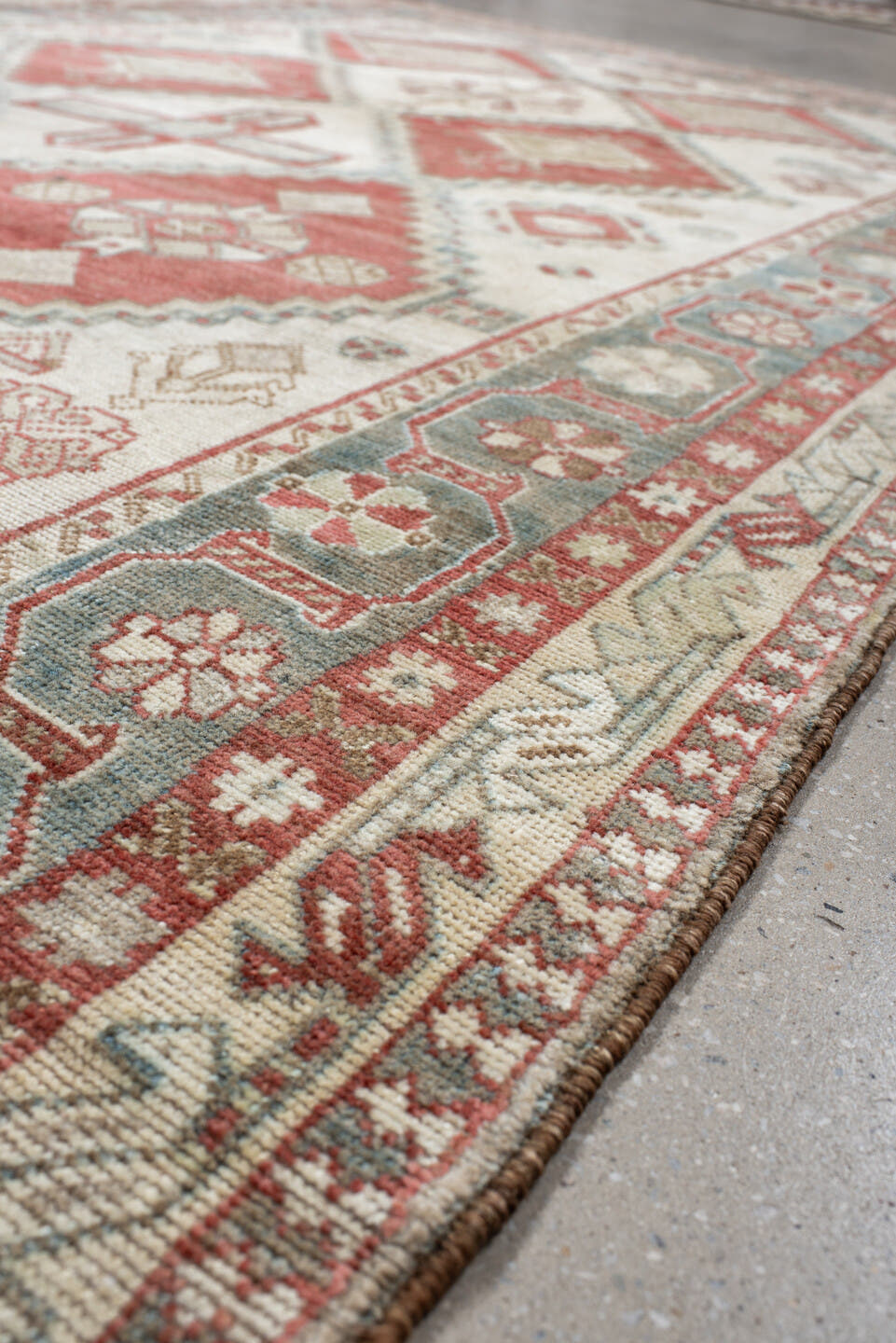 5' x 10' one-of-a-kind handmade vintage Shiraz medium size rug. Color palette: ivory, terra cotta, sky blue, rust, beige