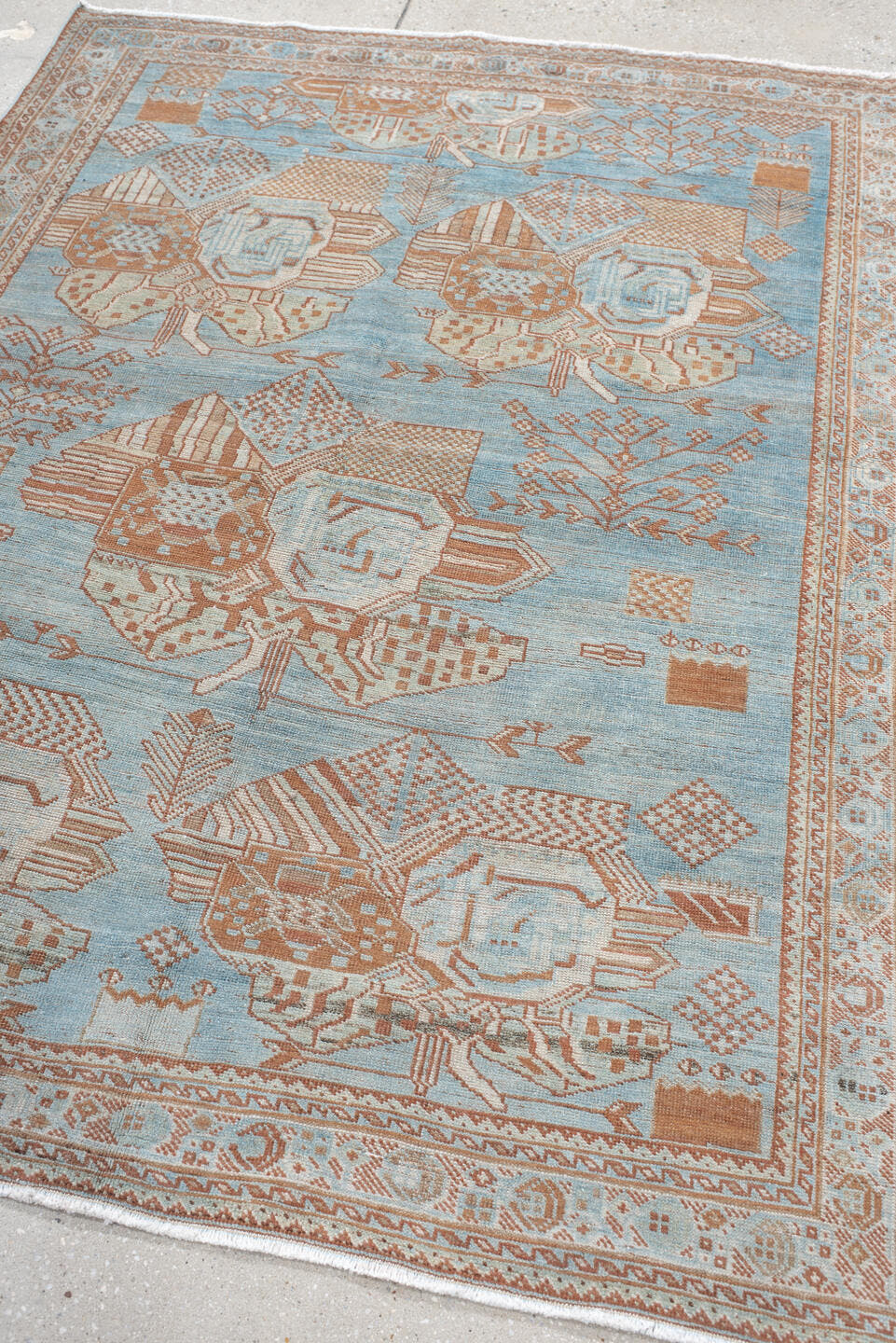 4' x 6' one-of-a-kind handmade vintage  small size rug. Color palette: sky blue, terracotta, ivory, peach, camel, light blue