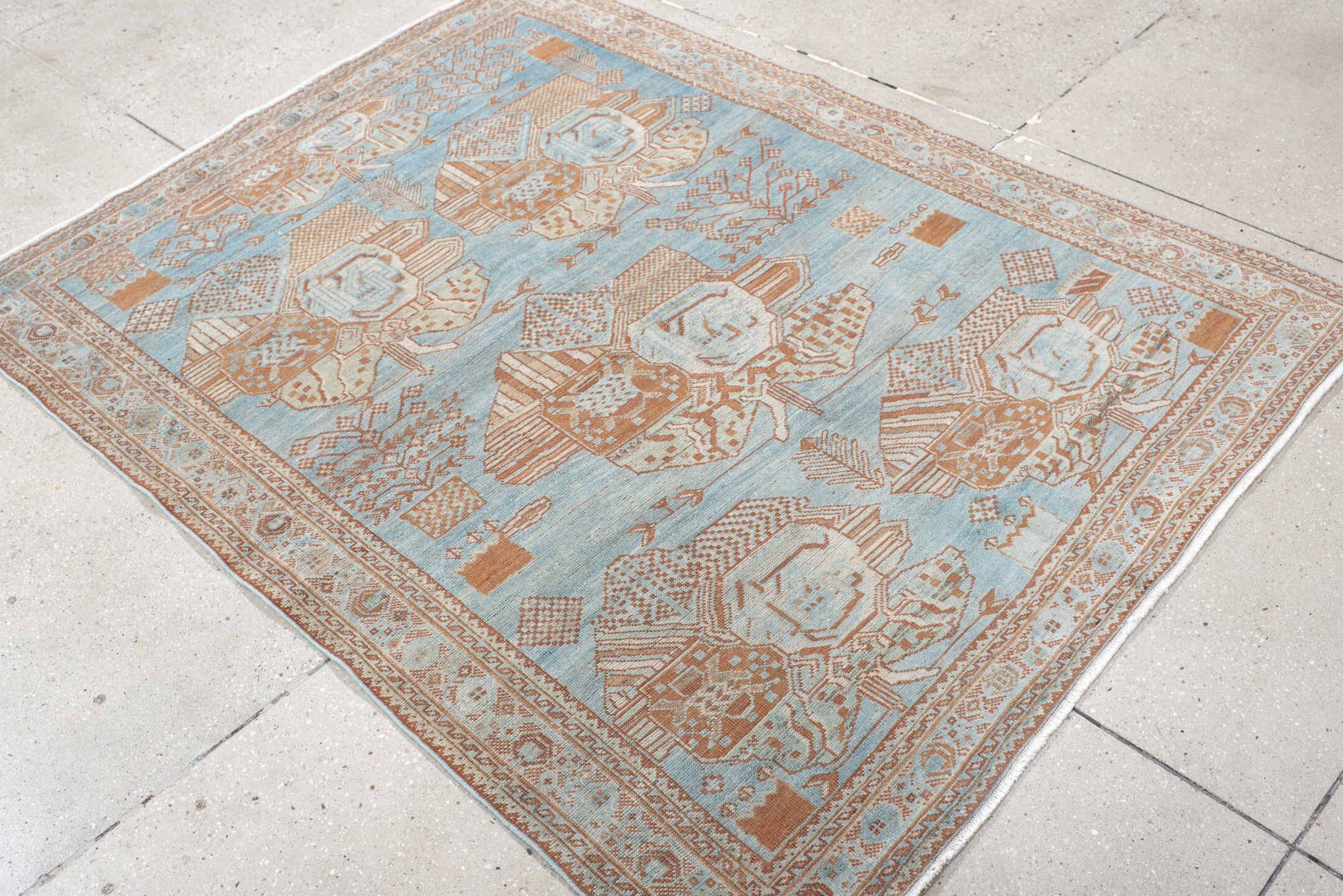 4' x 6' one-of-a-kind handmade vintage  small size rug. Color palette: sky blue, terracotta, ivory, peach, camel, light blue