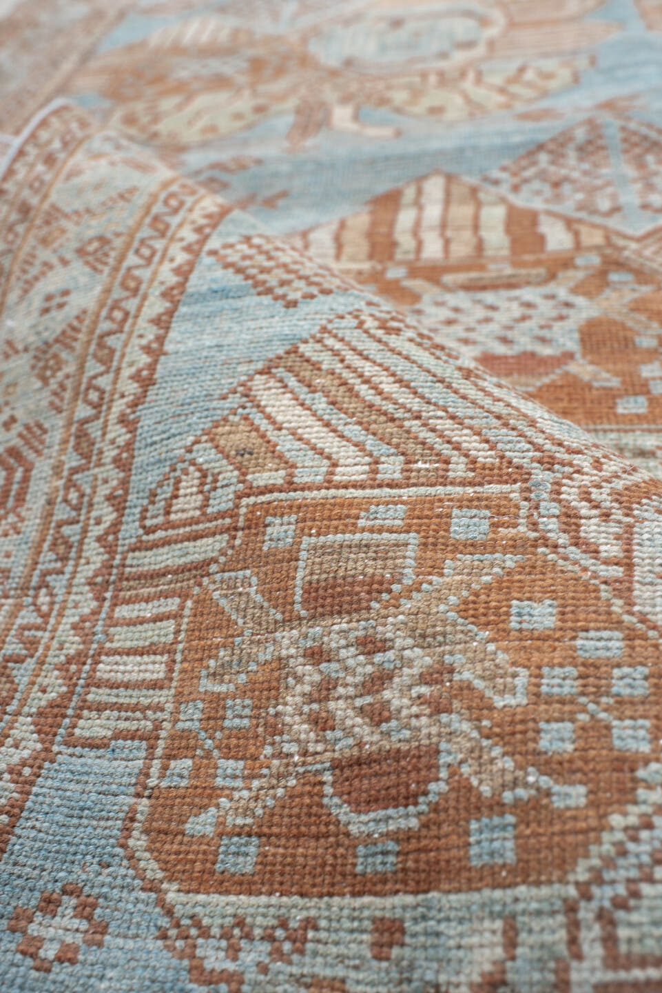 4' x 6' one-of-a-kind handmade vintage  small size rug. Color palette: sky blue, terracotta, ivory, peach, camel, light blue