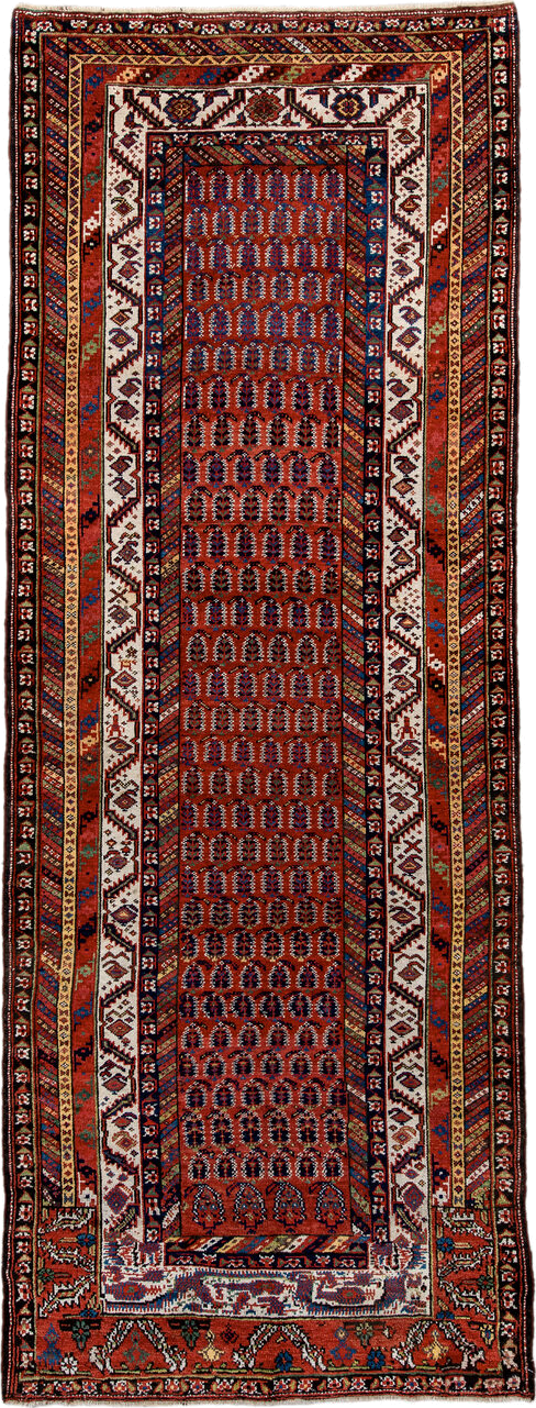 4' x 11' one-of-a-kind handmade antique NW Persian runner rug. Color palette: rust, ivory, indigo, navy, terra cotta, camel