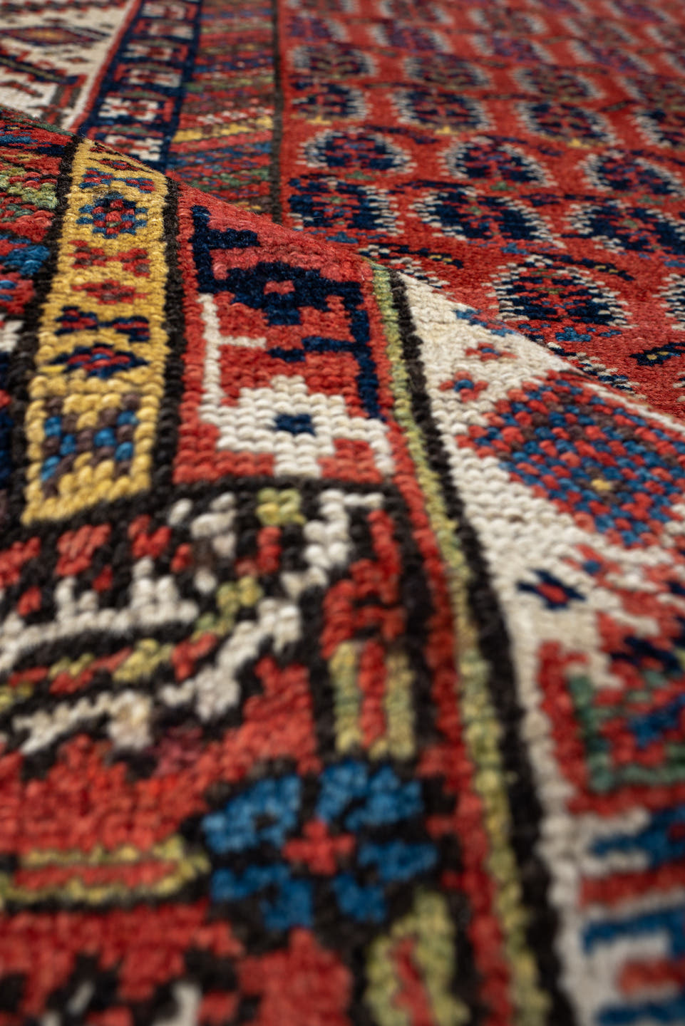 4' x 11' one-of-a-kind handmade antique NW Persian runner rug. Color palette: rust, ivory, indigo, navy, terra cotta, camel
