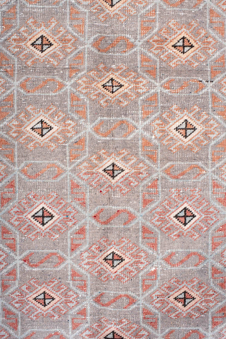 4' x 7' one-of-a-kind handmade vintage Sparta rug. Color palette: salmon, gray, ivory, charcoal, blush, pink, black