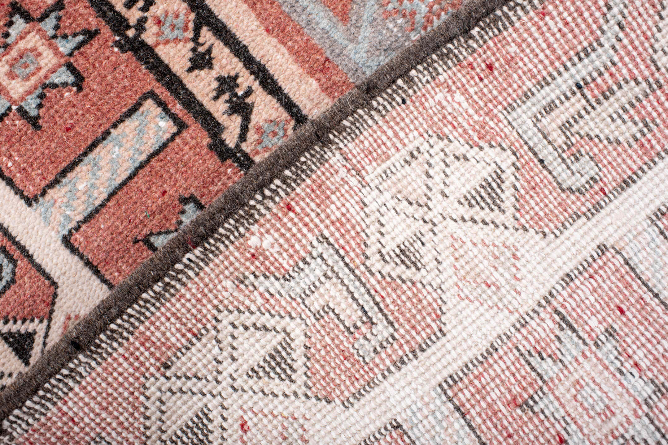 4' x 7' one-of-a-kind handmade vintage Sparta rug. Color palette: black, brown, gray, light gray, off-white, pink, red