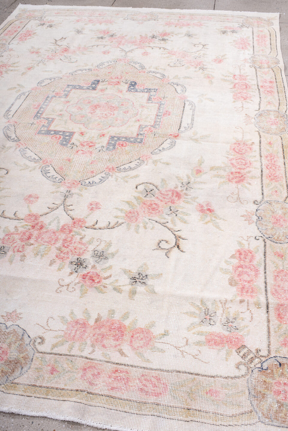 7' x 11' one-of-a-kind handmade vintage Sparta large size rug. Color palette: ivory, blush, beige, pale gray, soft blue