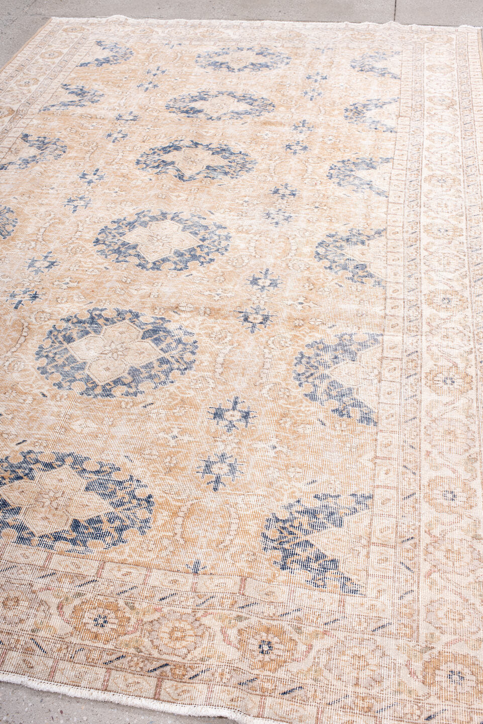 6' x 10' one-of-a-kind handmade vintage Sparta large size rug. Color palette: ivory, peach, beige, indigo, taupe, camel