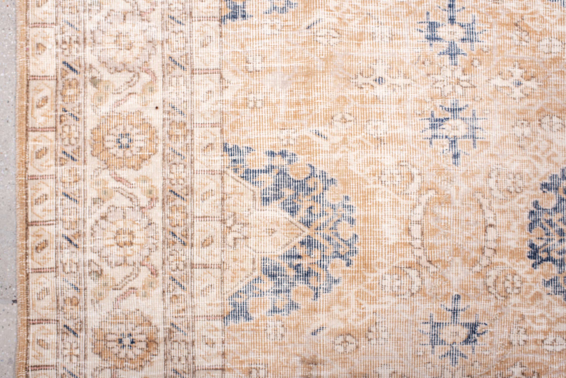 6' x 10' one-of-a-kind handmade vintage Sparta large size rug. Color palette: ivory, peach, beige, indigo, taupe, camel