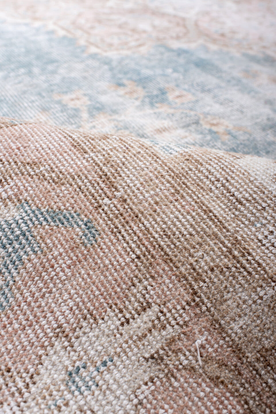 7' x 10' one-of-a-kind handmade vintage Sparta large size rug. Color palette: pale blue, blush, beige, ivory, taupe