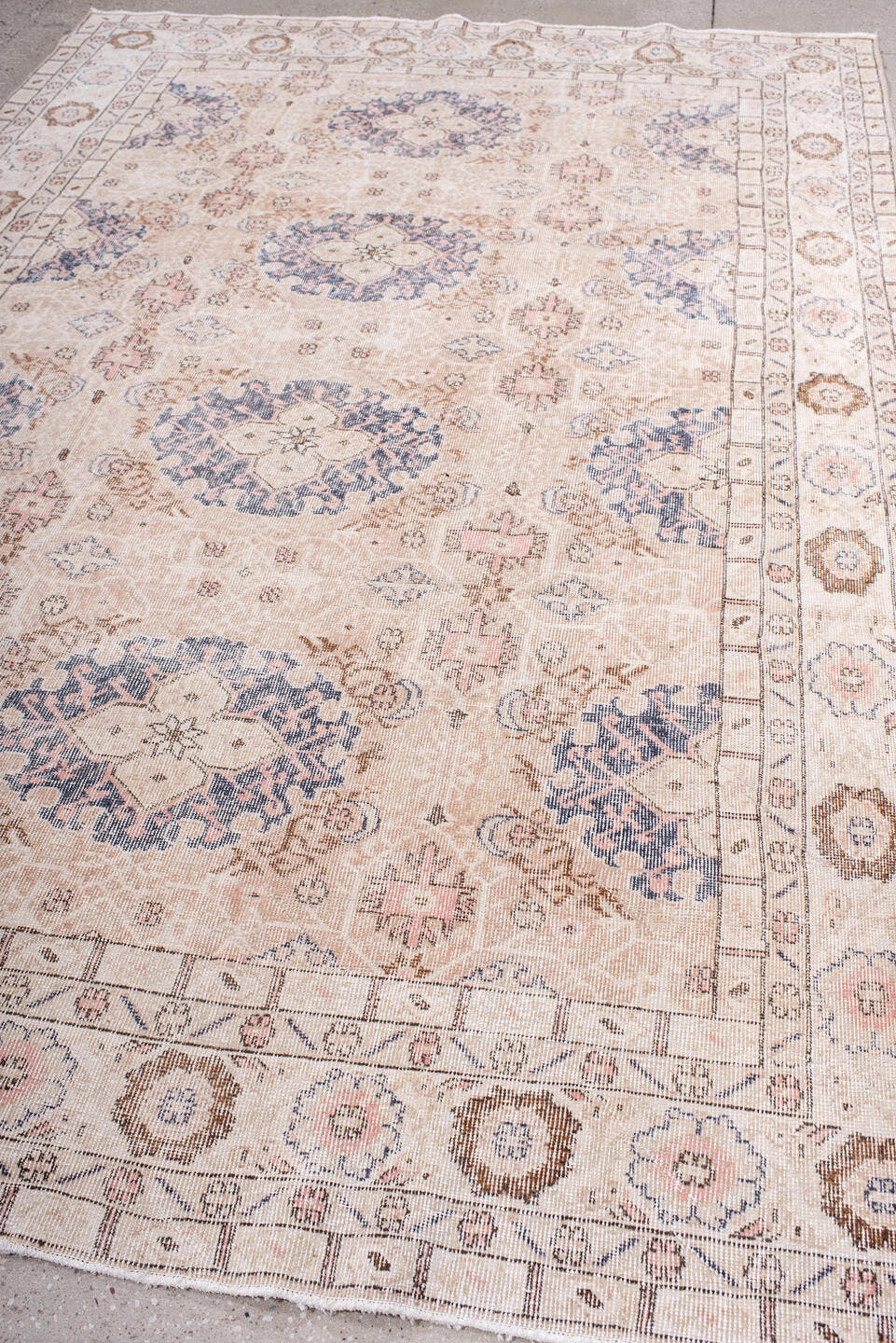 7' x 10' one-of-a-kind handmade vintage Sparta large size rug. Color palette: blush, ivory, powder blue, taupe, rose, camel