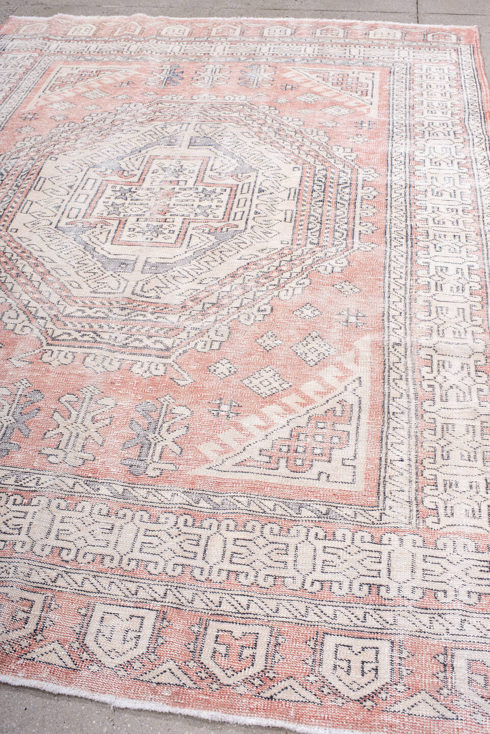 6' x 9' one-of-a-kind handmade vintage Sparta medium size rug. Color palette: rose, ivory, slate, blush, taupe, pink, red