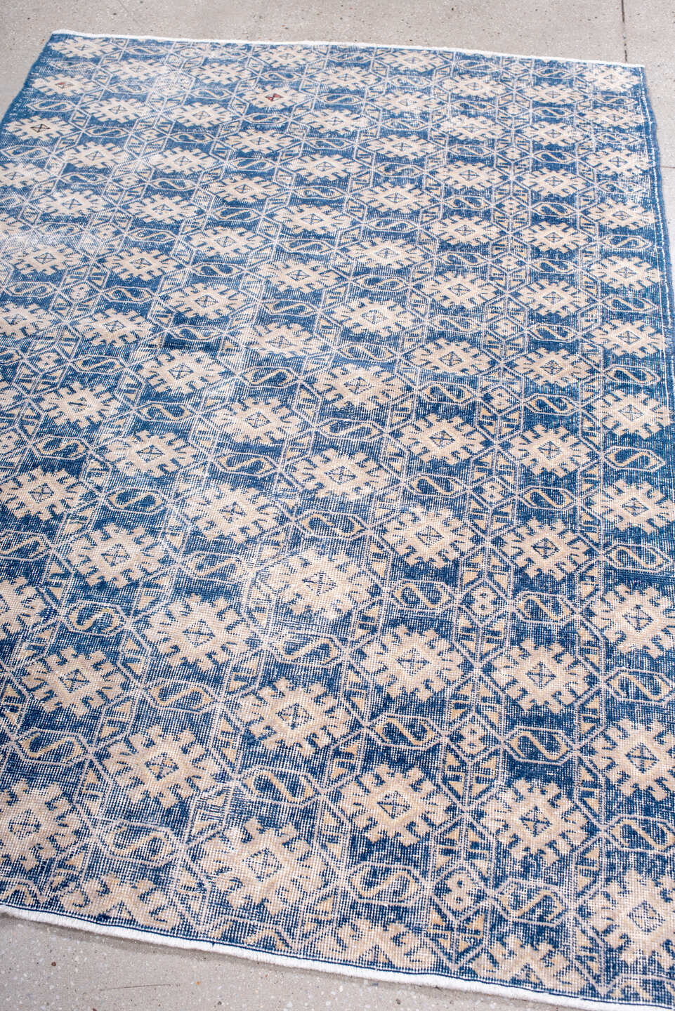 4' x 6' one-of-a-kind handmade vintage Sparta small size rug. Color palette: indigo, ivory, denim, slate, purple, blue, gray
