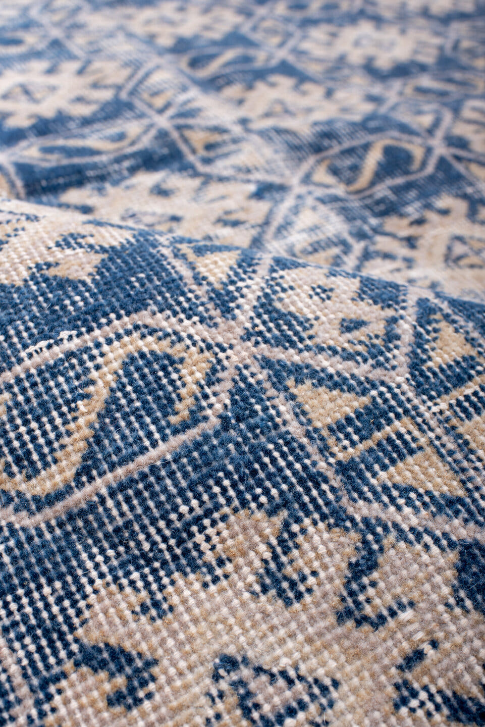 4' x 6' one-of-a-kind handmade vintage Sparta small size rug. Color palette: indigo, ivory, denim, slate, purple, blue, gray