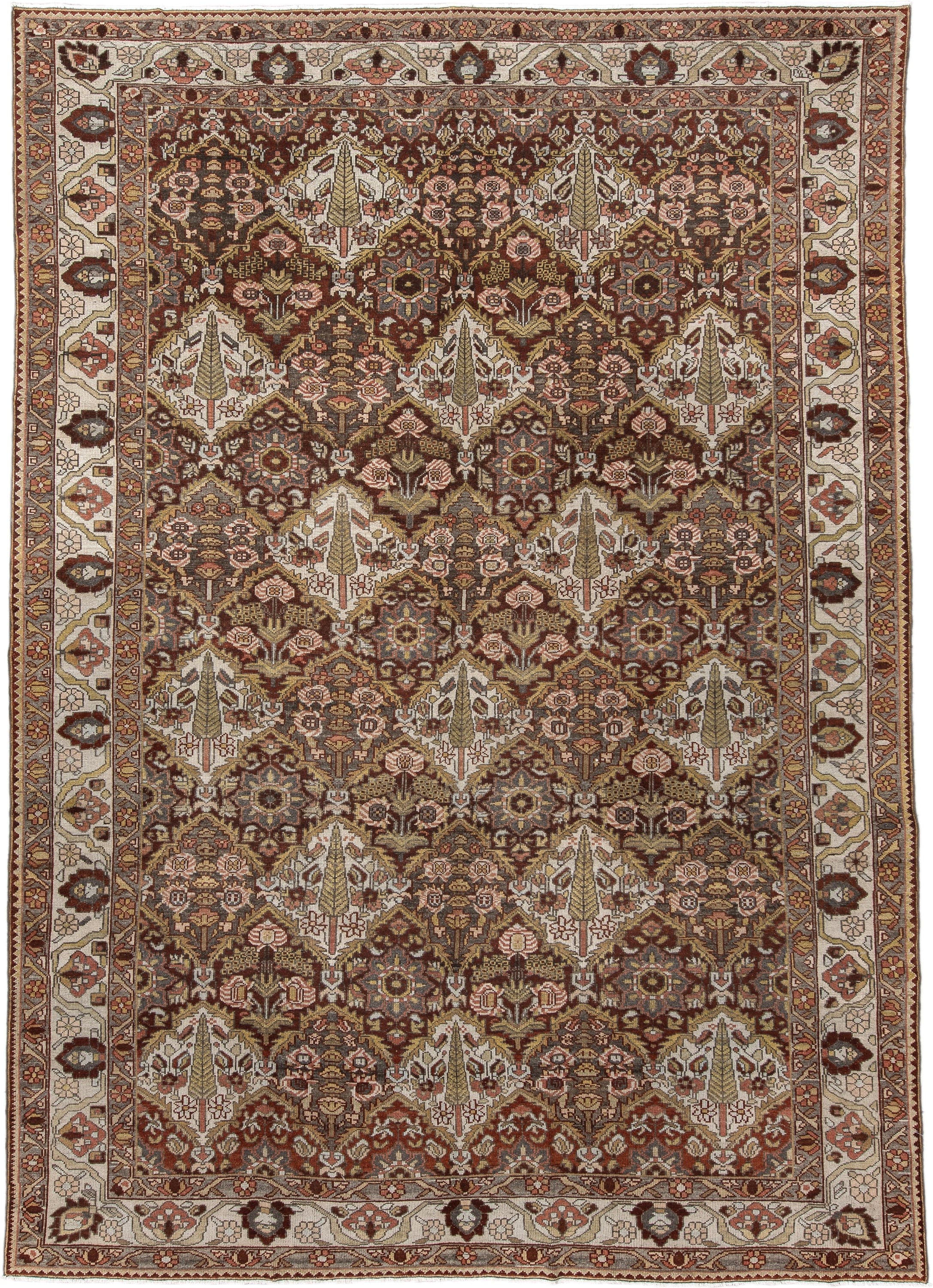 8' x 11' one-of-a-kind handmade antique Baktiary large size rug. Color palette: ivory, rust, brown, camel, taupe, sage, rose