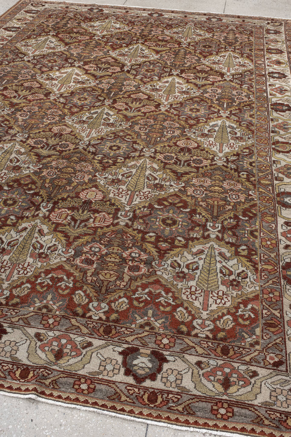 8' x 11' one-of-a-kind handmade antique Baktiary large size rug. Color palette: ivory, rust, brown, camel, taupe, sage, rose