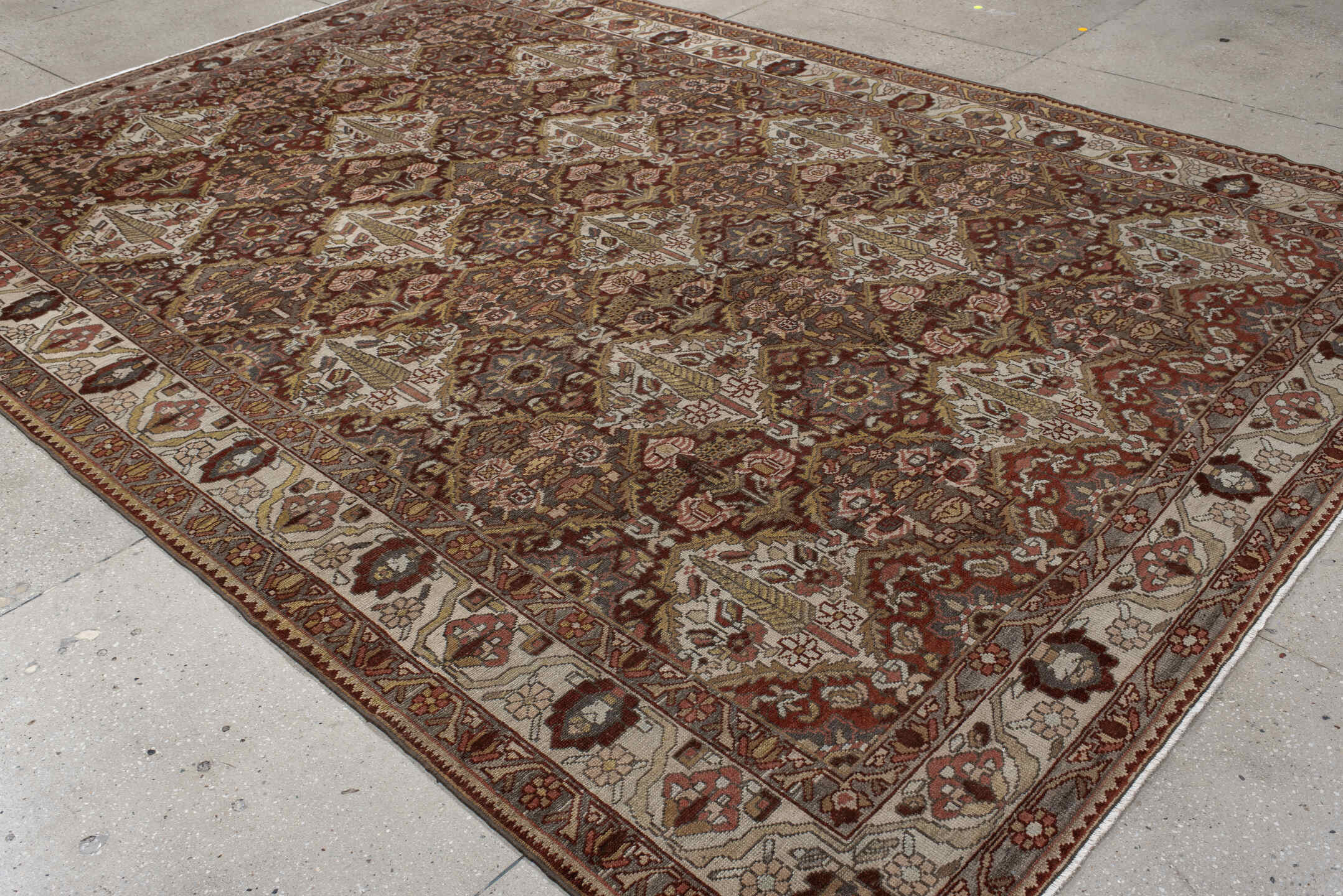 8' x 11' one-of-a-kind handmade antique Baktiary large size rug. Color palette: ivory, rust, brown, camel, taupe, sage, rose