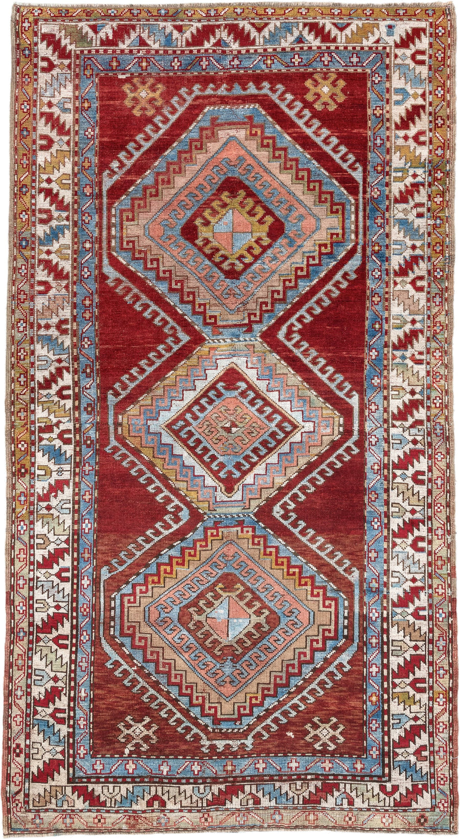 4' x 7' one-of-a-kind handmade vintage Kazak rug. Color palette: rust, ivory, sky blue, brick red, camel, taupe, gold, brown
