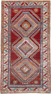 4' x 7' one-of-a-kind handmade vintage Kazak rug. Color palette: rust, ivory, sky blue, brick red, camel, taupe, gold, brown