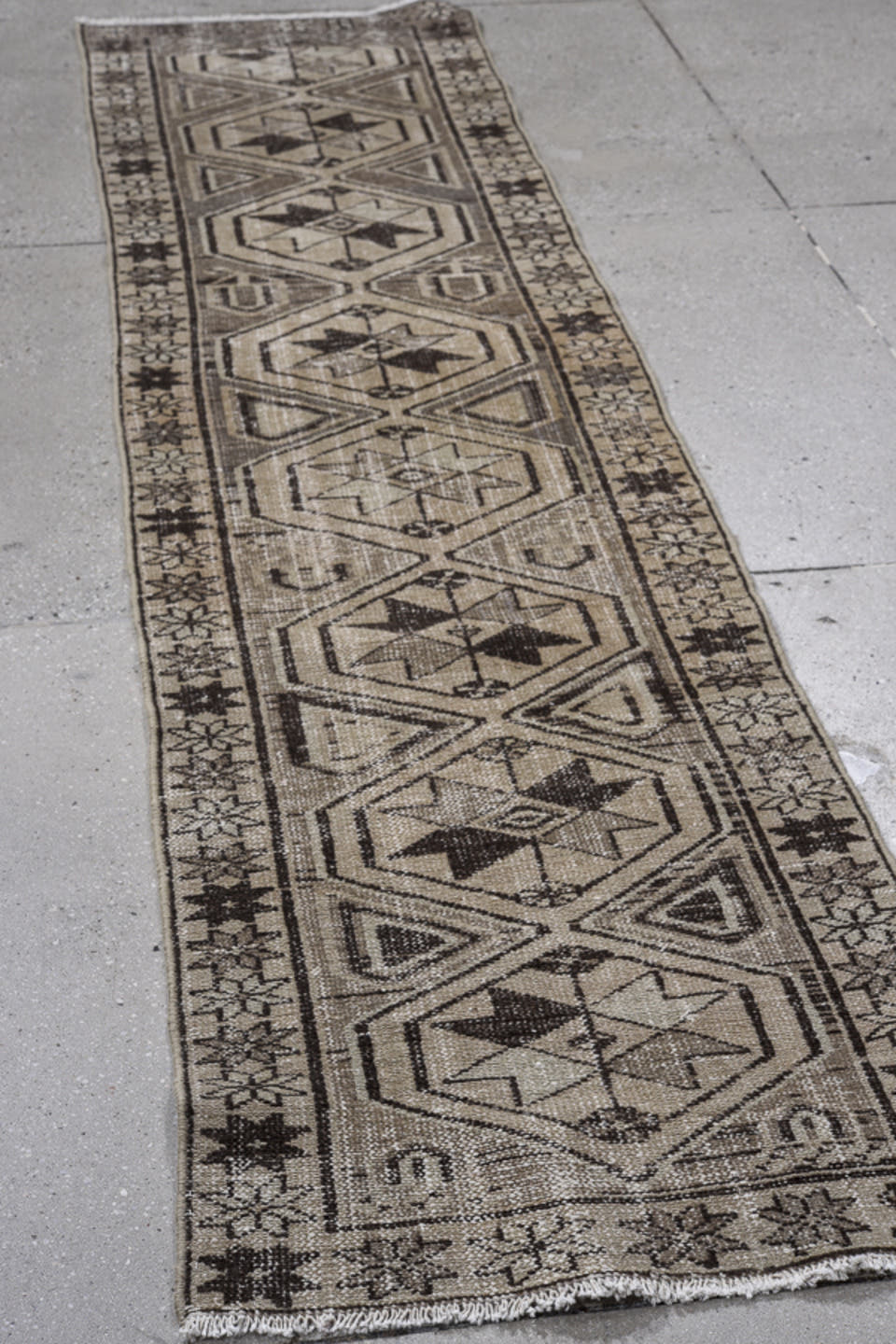 2' x 9' one-of-a-kind handmade vintage Baktiary runner rug. Color palette: taupe, ivory, charcoal, brown, beige, gray, black