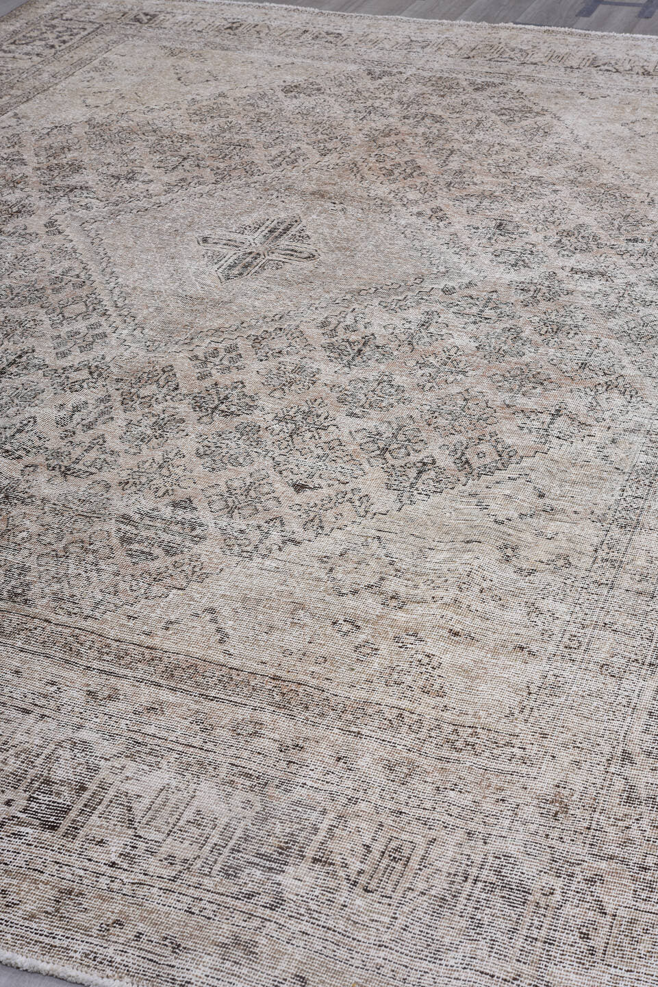 9' x 12' one-of-a-kind handmade antique Joshegan large size rug. Color palette: taupe, ivory, beige, gray, charcoal, black