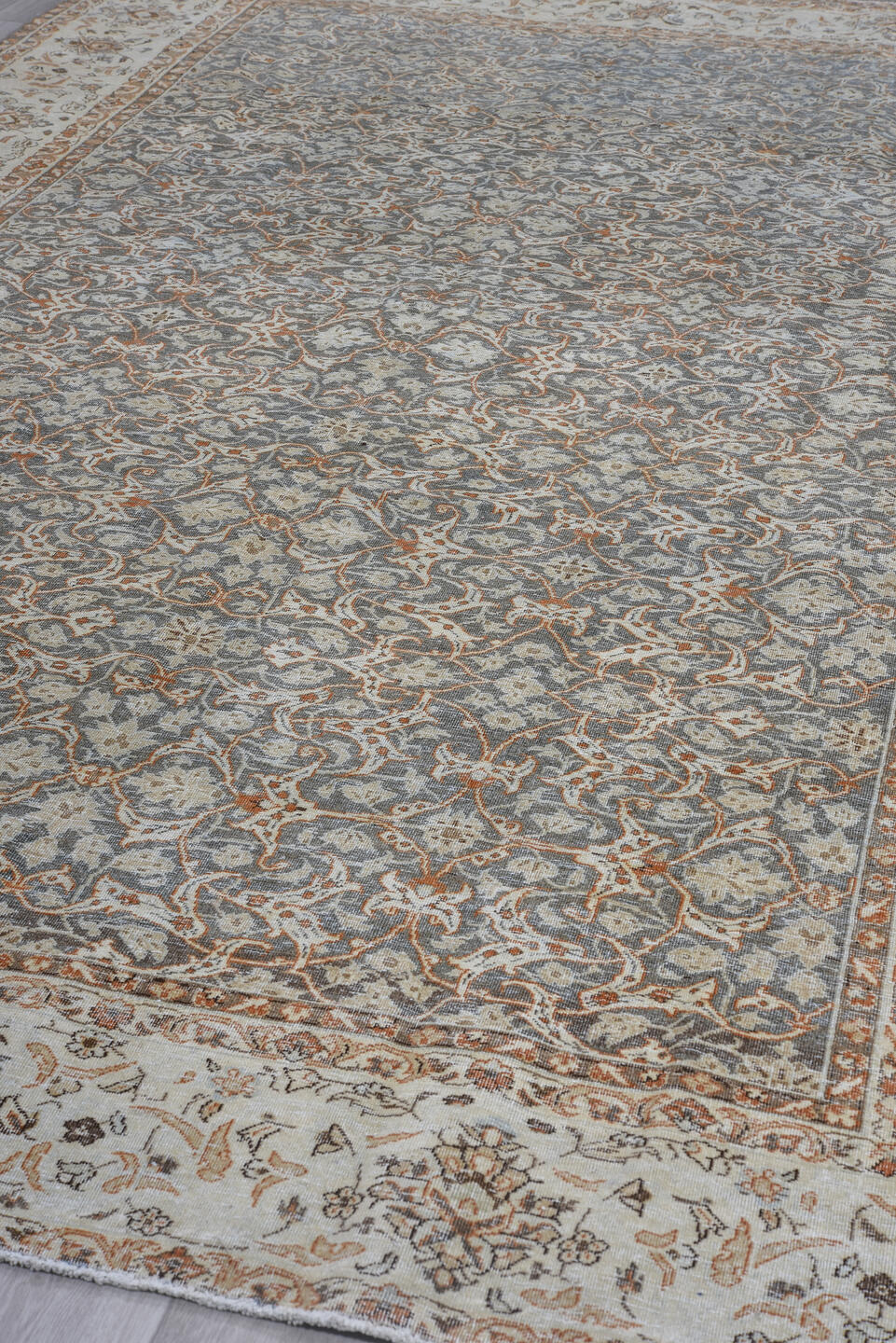 7' x 11' one-of-a-kind handmade antique Tabriz large size rug. Color palette: ivory, blue, taupe, rust, slate, camel, beige