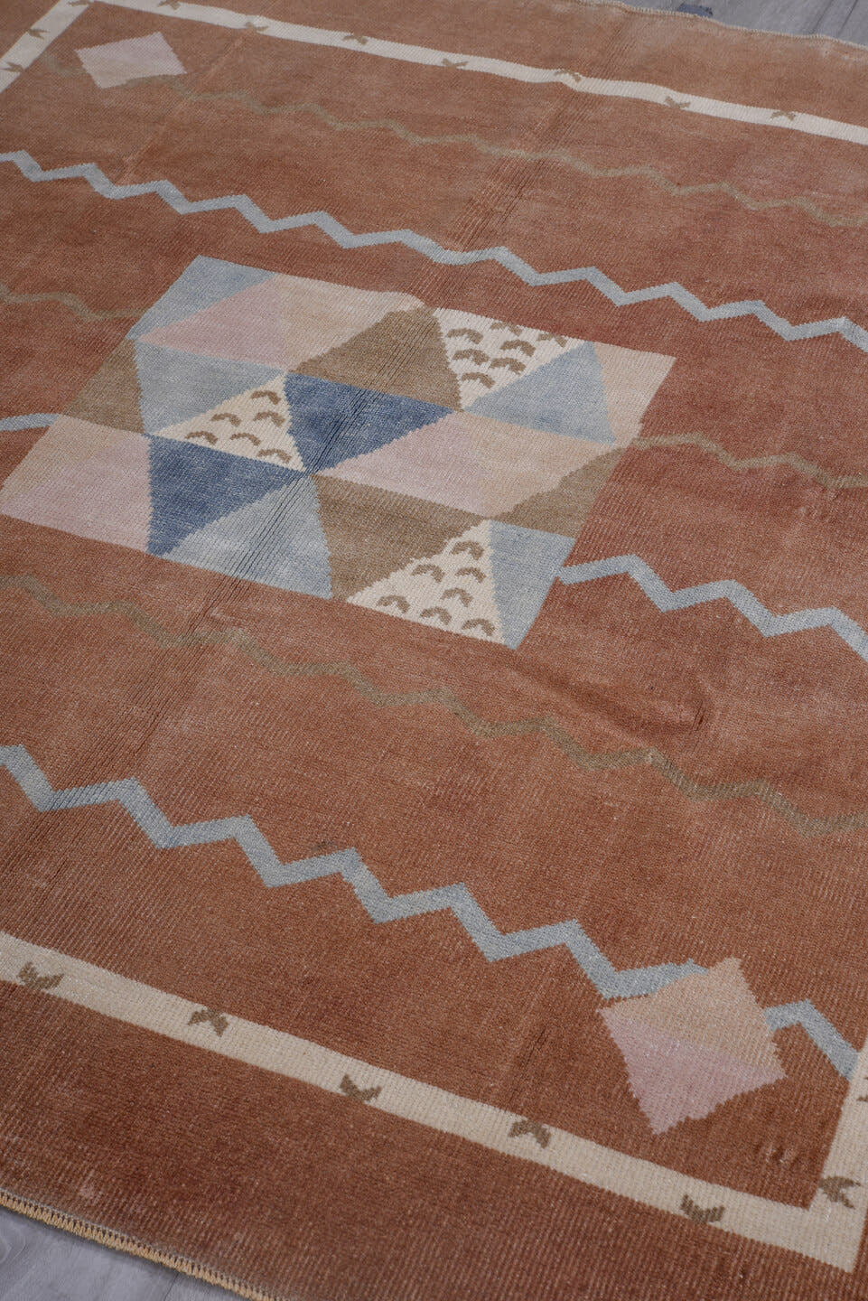 5' x 6' one-of-a-kind handmade antique Art Deco rug. Color palette: terra cotta, ivory, powder blue, taupe, blush, navy