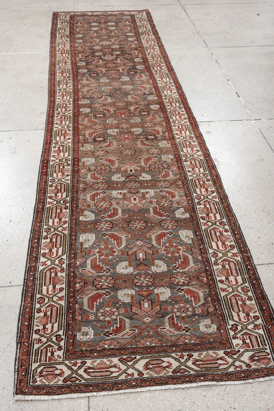 10' x 2' one-of-a-kind handmade vintage  rug. Color palette: slate, rust, ivory, terracotta, rose, charcoal, taupe, gray