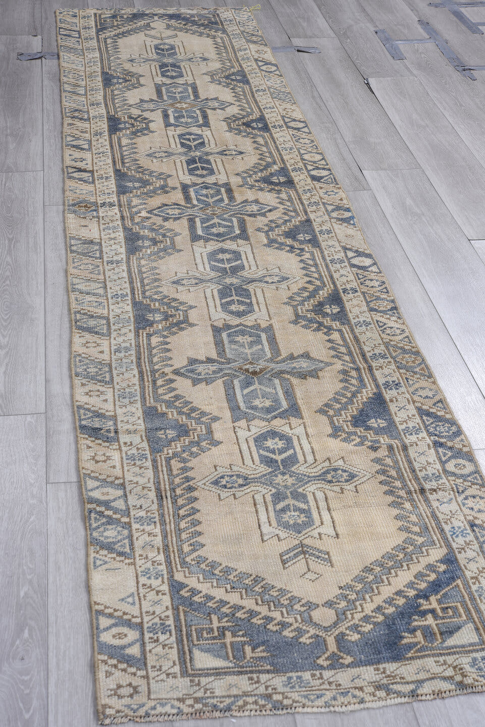 2' x 11' one-of-a-kind handmade antique Oushak runner rug. Color palette: ivory, slate, blue, taupe, charcoal, gray, beige