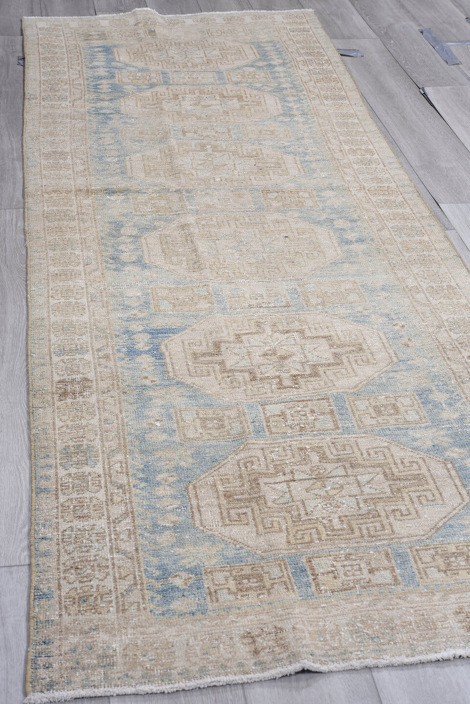 3' x 9' one-of-a-kind handmade antique Oushak runner rug. Color palette: ivory, sky blue, beige, taupe, sand, light blue