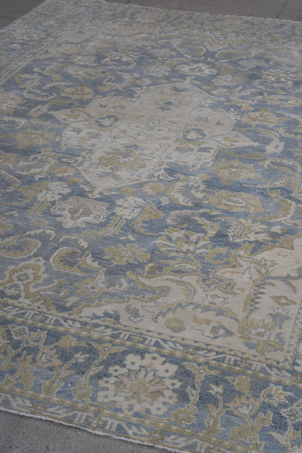 7' x 10' one-of-a-kind handmade antique Heriz large size rug. Color palette: light blue, ivory, beige, taupe, sage, gray