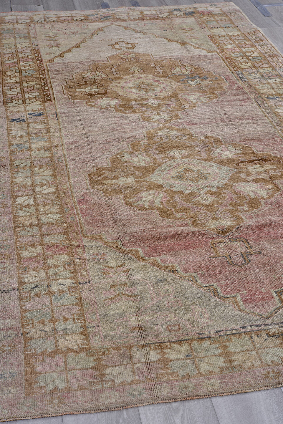 5' x 9' one-of-a-kind handmade antique Oushak medium size rug. Color palette: blush, ivory, taupe, camel, dusty rose, sage