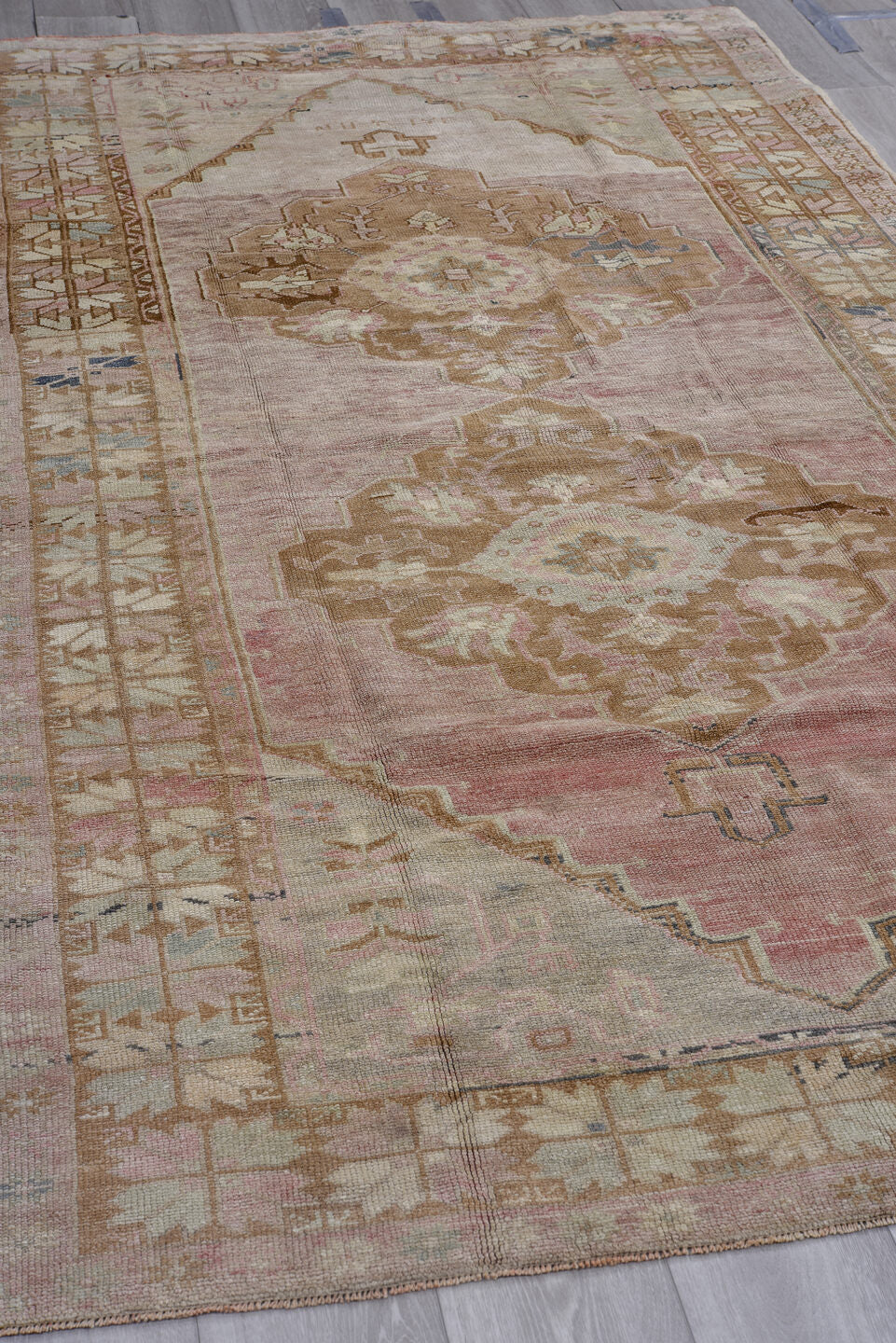 5' x 9' one-of-a-kind handmade antique Oushak medium size rug. Color palette: blush, ivory, taupe, camel, dusty rose, sage