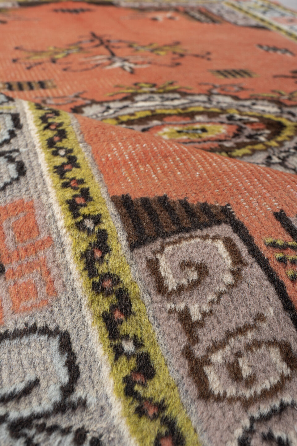 2' x 3' one-of-a-kind handmade vintage Oushak small size rug. Color palette: brown, pink, gray, off-white, orange, black