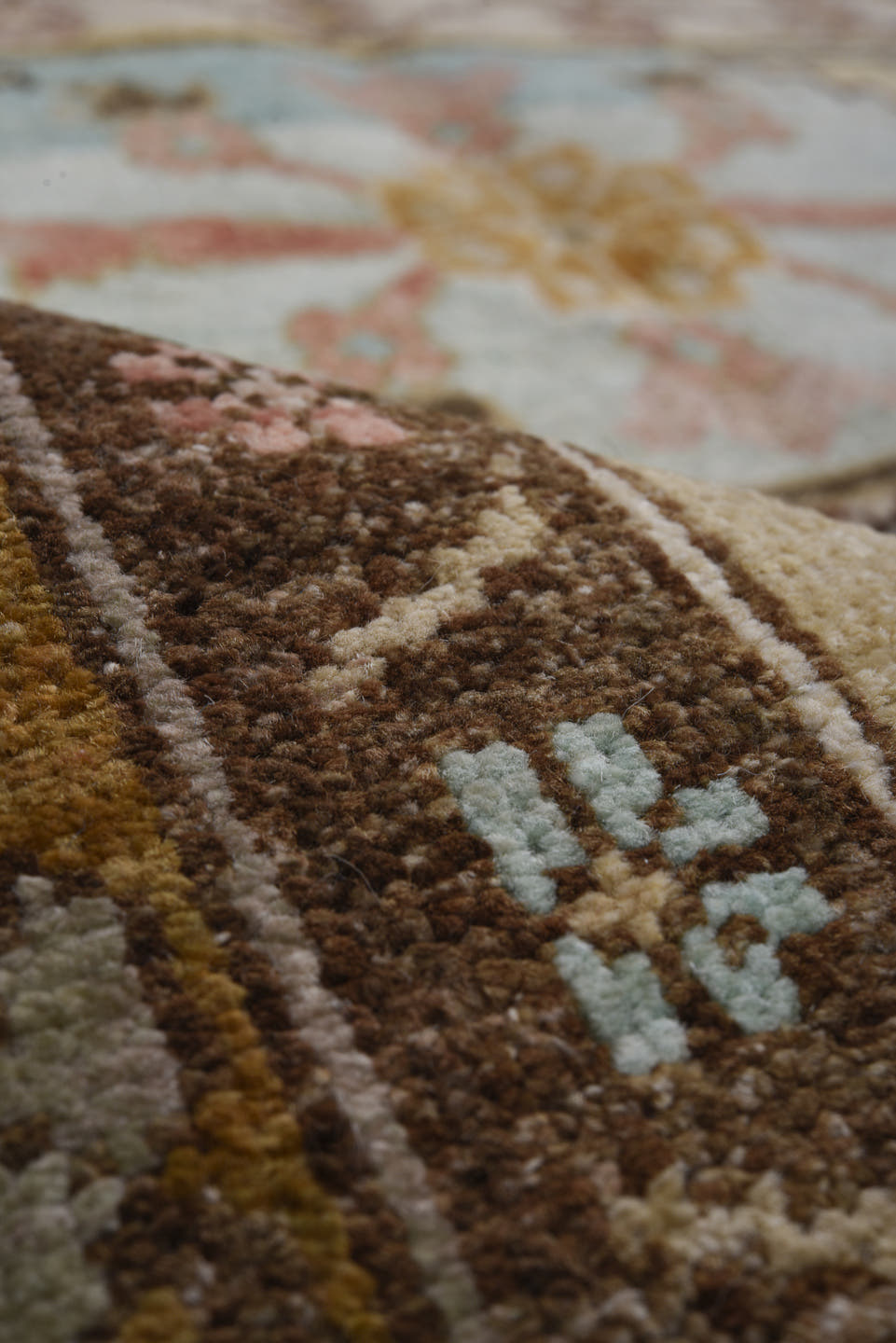 4' x 10' one-of-a-kind handmade vintage Sarab runner rug. Color palette: camel, brown, ivory, sky_blue, taupe, rose