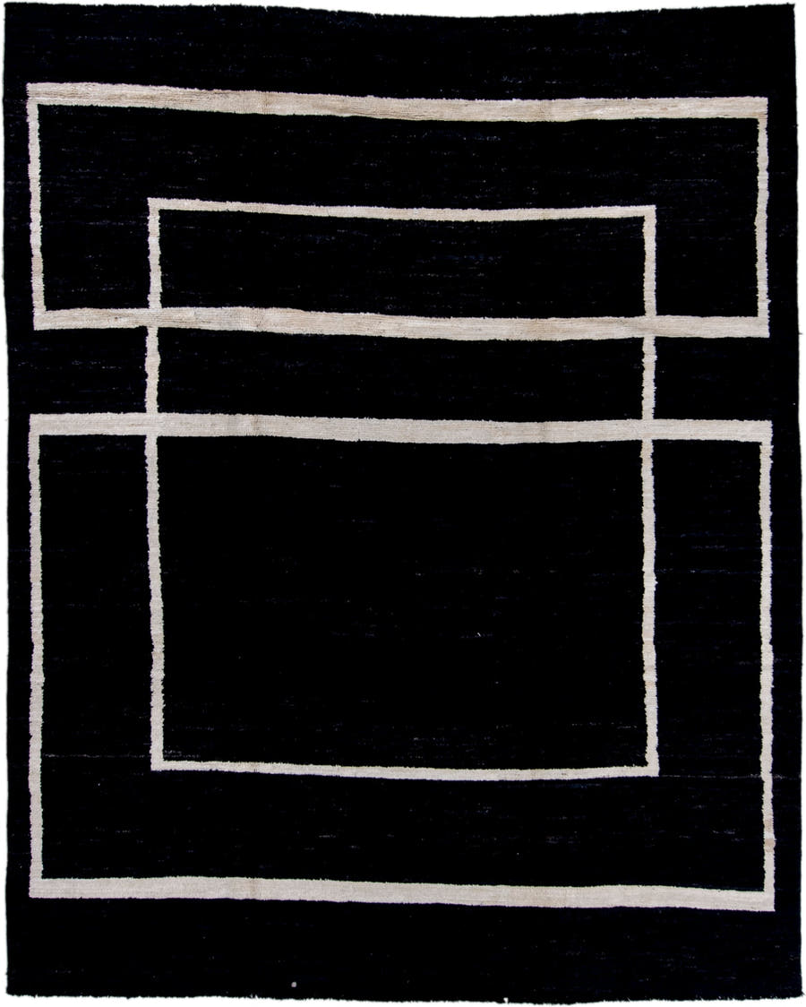 7' x 9' one-of-a-kind handmade vintage Tulu large size rug. Color palette: black, ivory