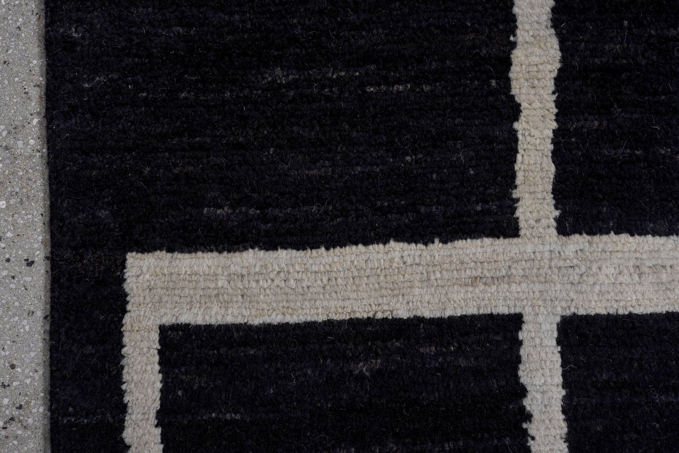 7' x 9' one-of-a-kind handmade vintage Tulu large size rug. Color palette: black, ivory