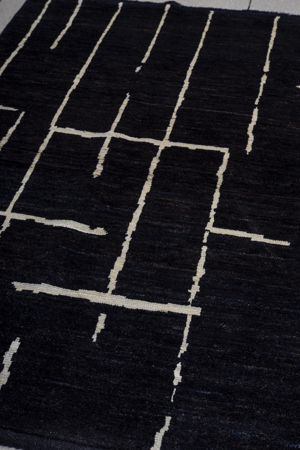 4' x 6' one-of-a-kind handmade vintage Tulu small size rug. Color palette: black, ivory