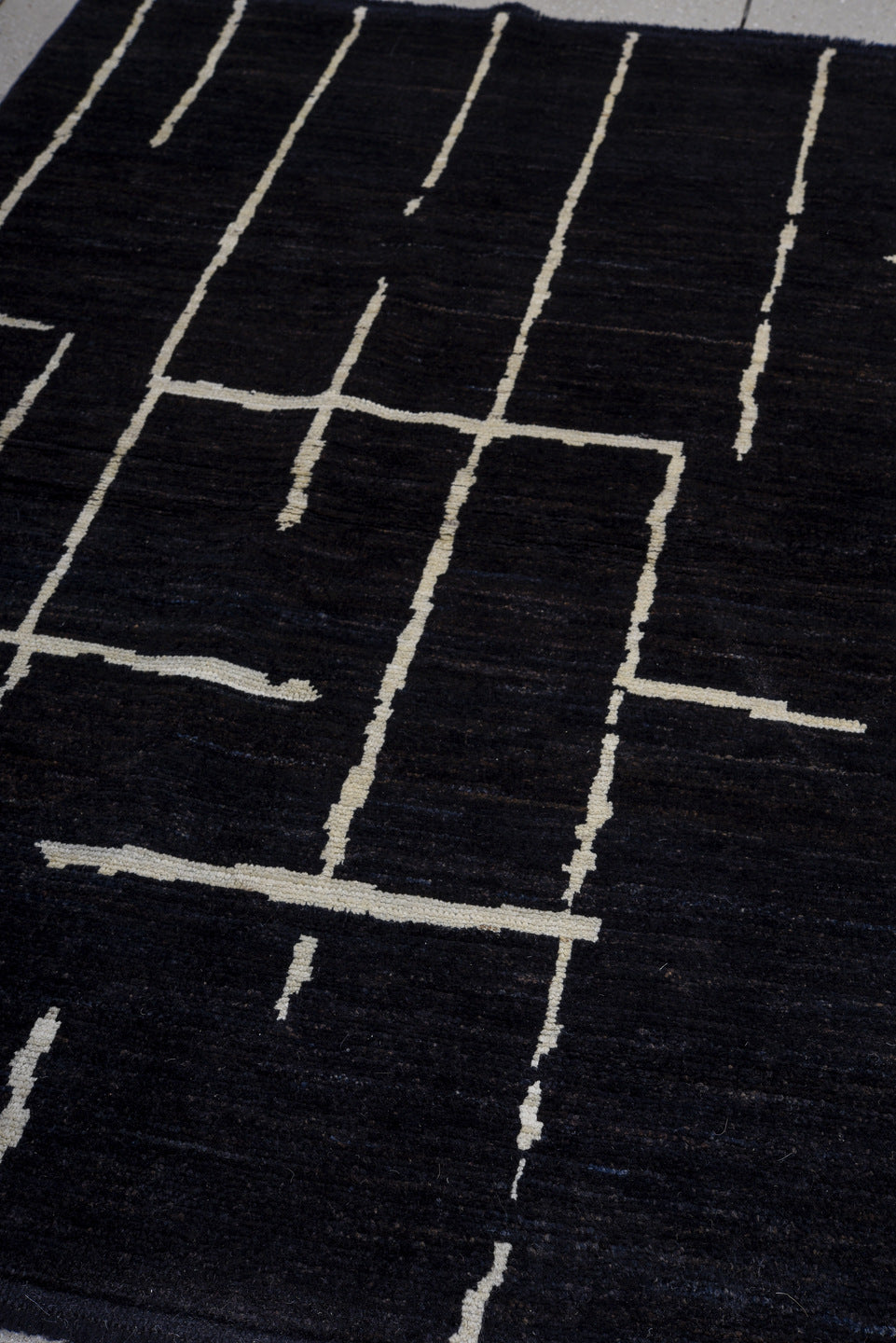 4' x 6' one-of-a-kind handmade vintage Tulu small size rug. Color palette: black, ivory