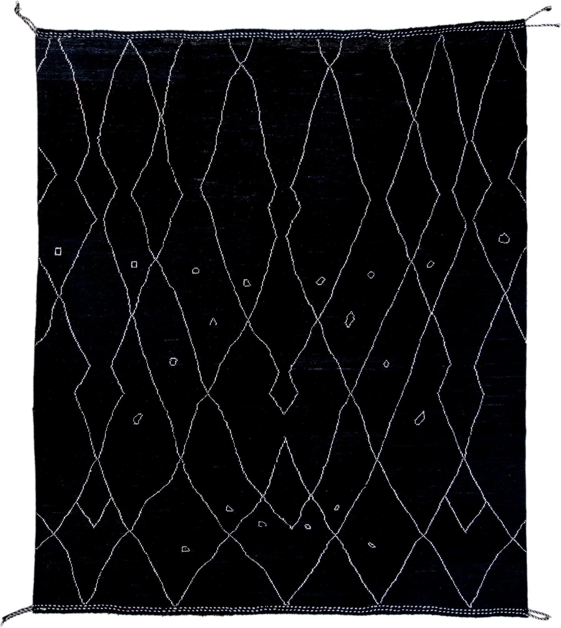 8' x 9' one-of-a-kind handmade vintage Tulu rug. Color palette: black, ivory