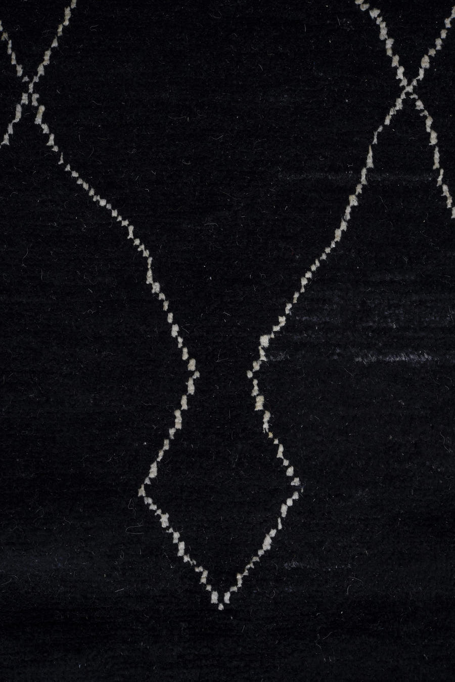 8' x 9' one-of-a-kind handmade vintage Tulu rug. Color palette: black, ivory