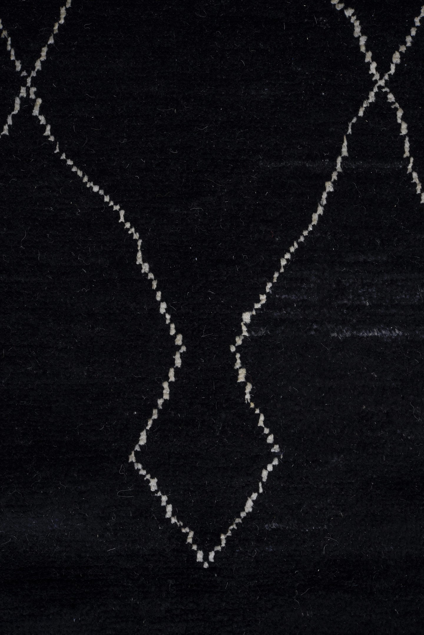8' x 9' one-of-a-kind handmade vintage Tulu rug. Color palette: black, ivory