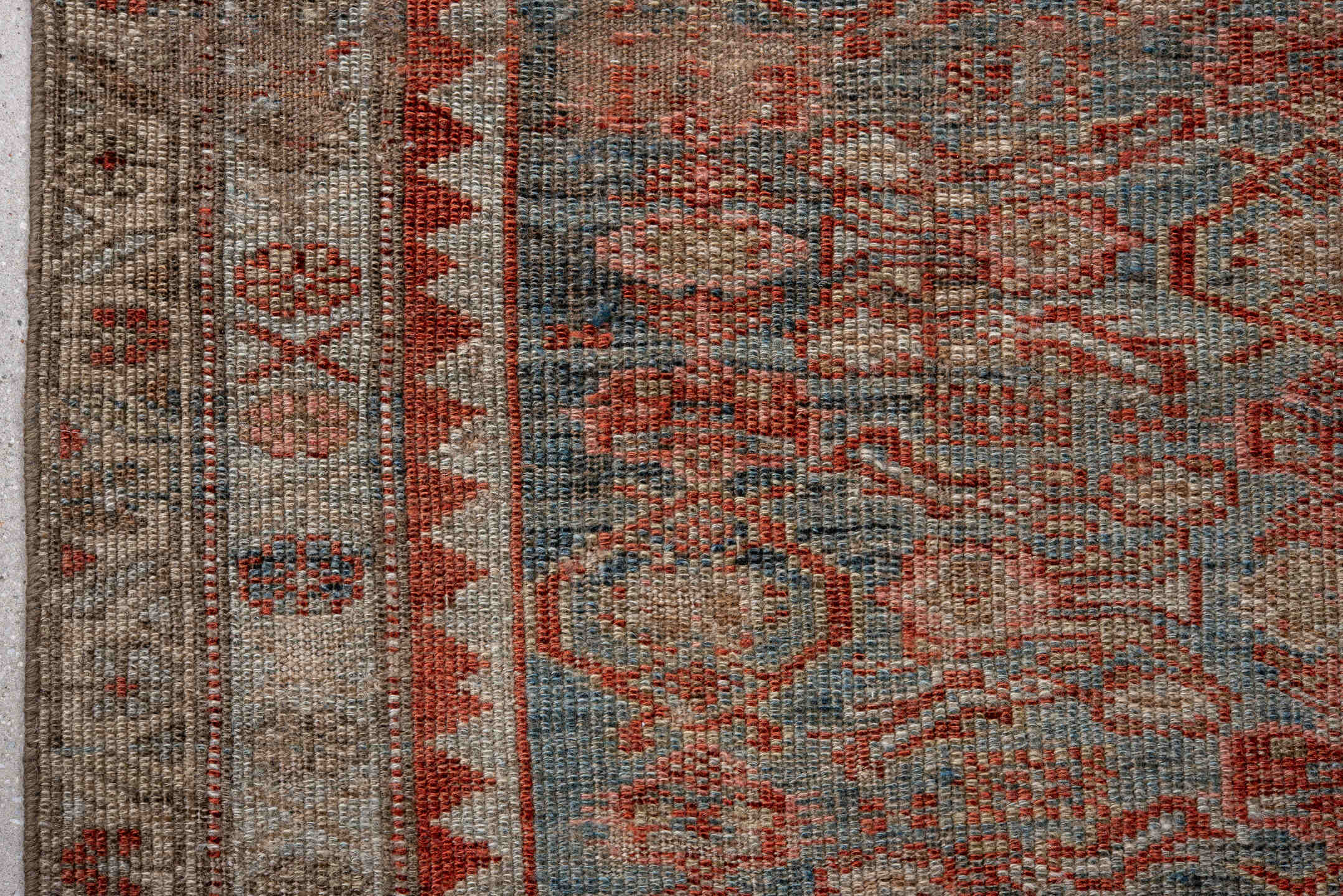 3' x 11' one-of-a-kind handmade antique Kurd runner rug. Color palette: ivory, rust, blue, taupe, brown, charcoal