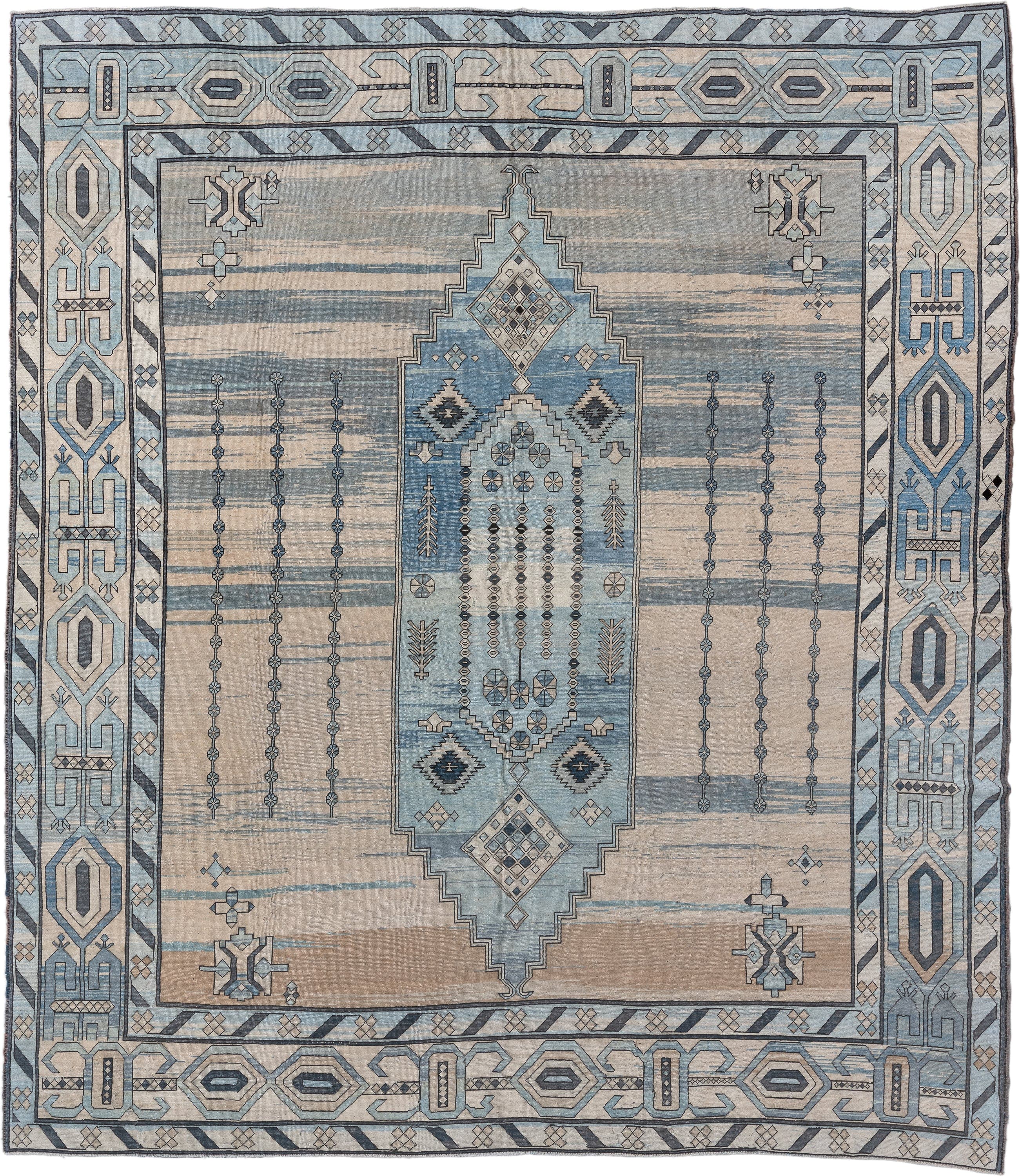 12' x 14' one-of-a-kind handmade antique Kars oversize rug. Color palette: ivory, pale blue, slate, sky blue, taupe