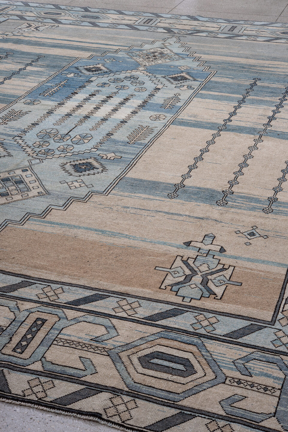 12' x 14' one-of-a-kind handmade antique Kars oversize rug. Color palette: ivory, pale blue, slate, sky blue, taupe