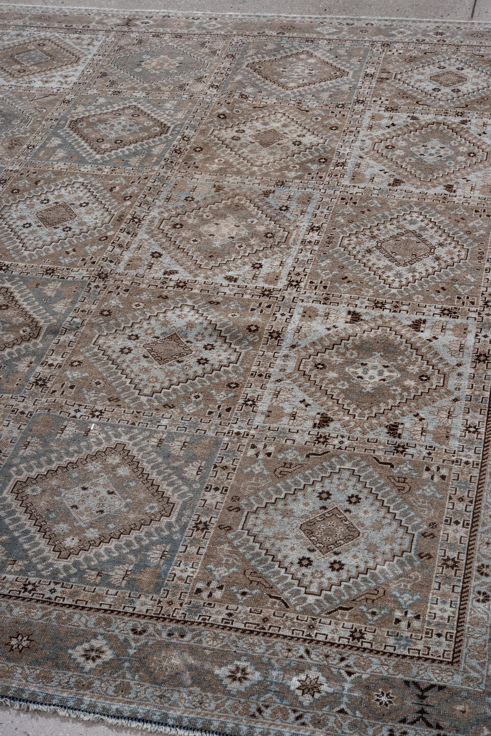 6' x 8' one-of-a-kind handmade antique Shiraz medium size rug. Color palette: taupe, camel, slate, ivory, brown, charcoal