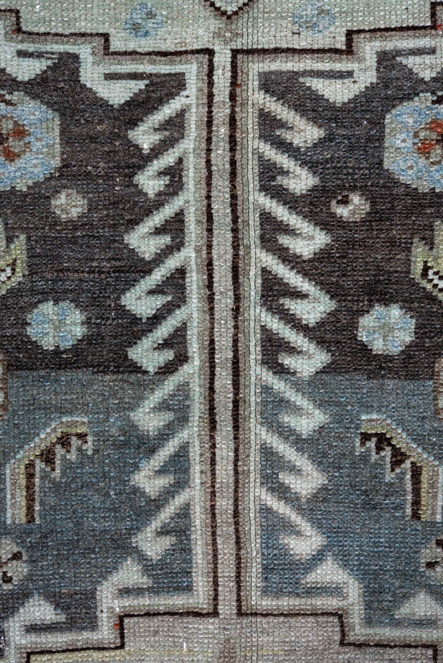 4' x 10' one-of-a-kind handmade antique Kurd runner rug. Color palette: blue, ivory, rust, charcoal, light blue, brown