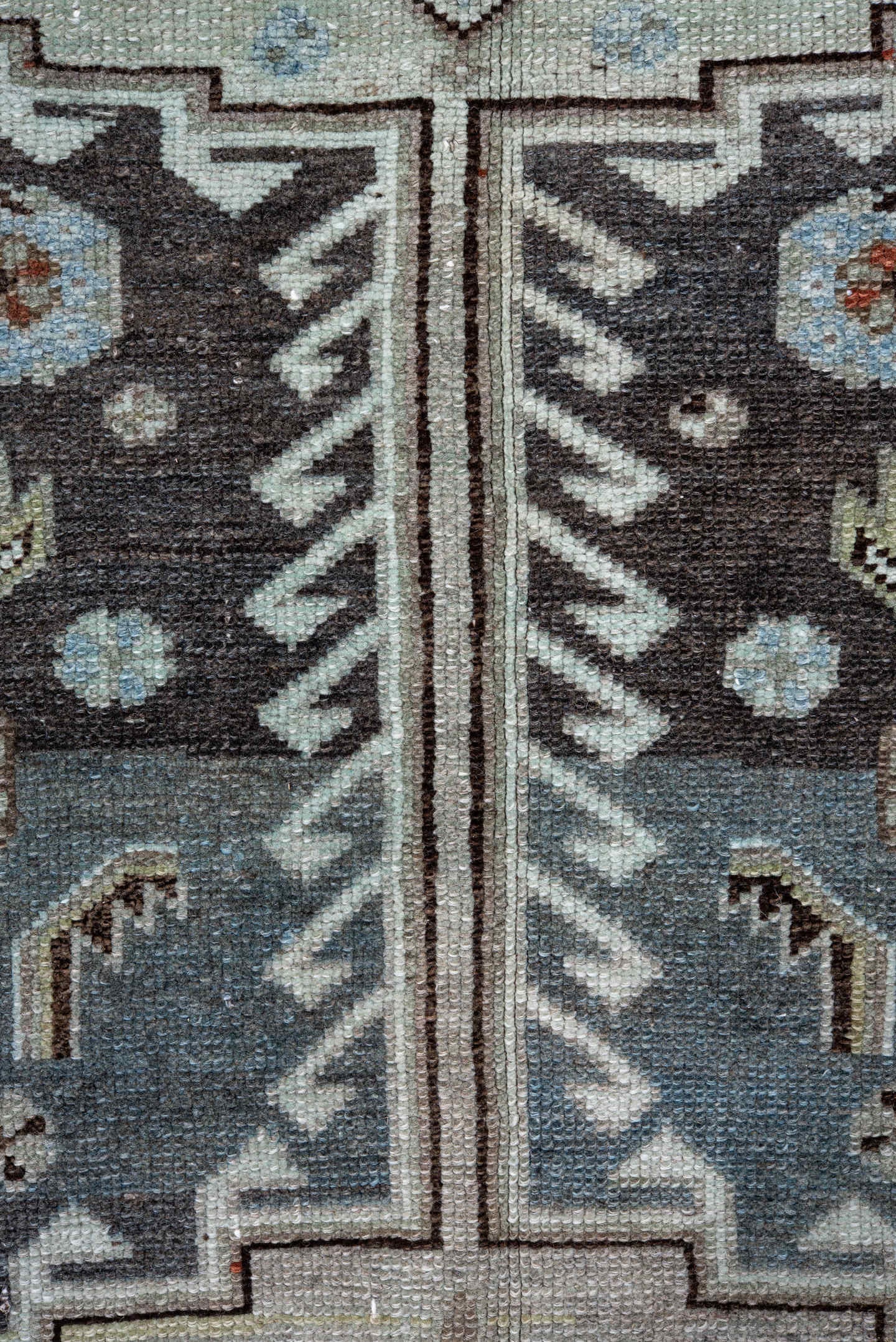 4' x 10' one-of-a-kind handmade antique Kurd runner rug. Color palette: blue, ivory, rust, charcoal, light blue, brown