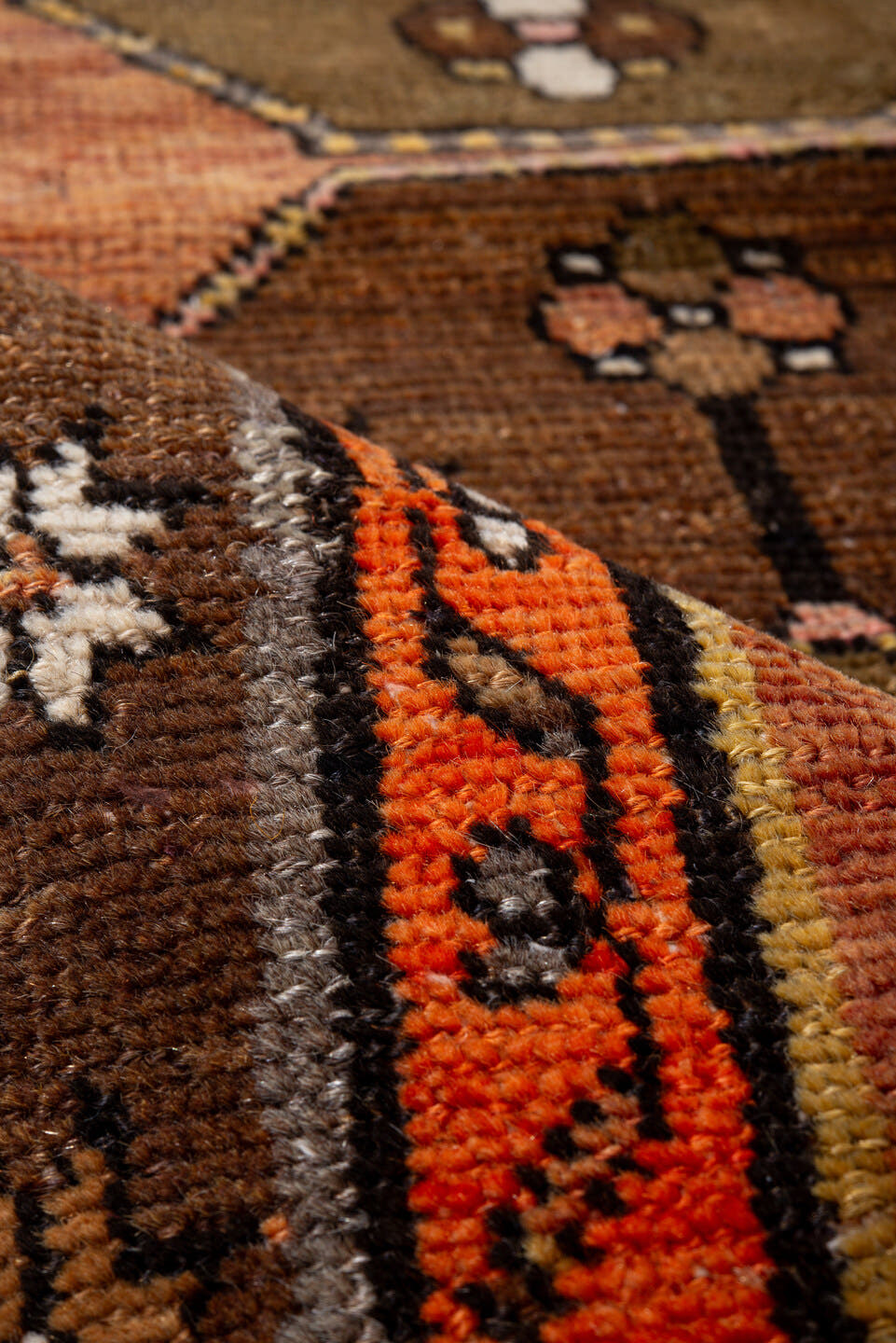 2' x 10' one-of-a-kind handmade antique Kars runner rug. Color palette: salmon, brown, olive, rust, ivory, coral, taupe