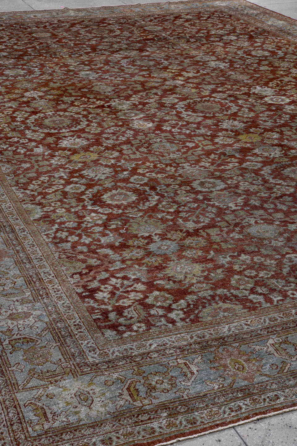 12' x 17' one-of-a-kind handmade vintage Sultanabad oversize rug. Color palette: rust, pale blue, ivory, taupe, sage, camel